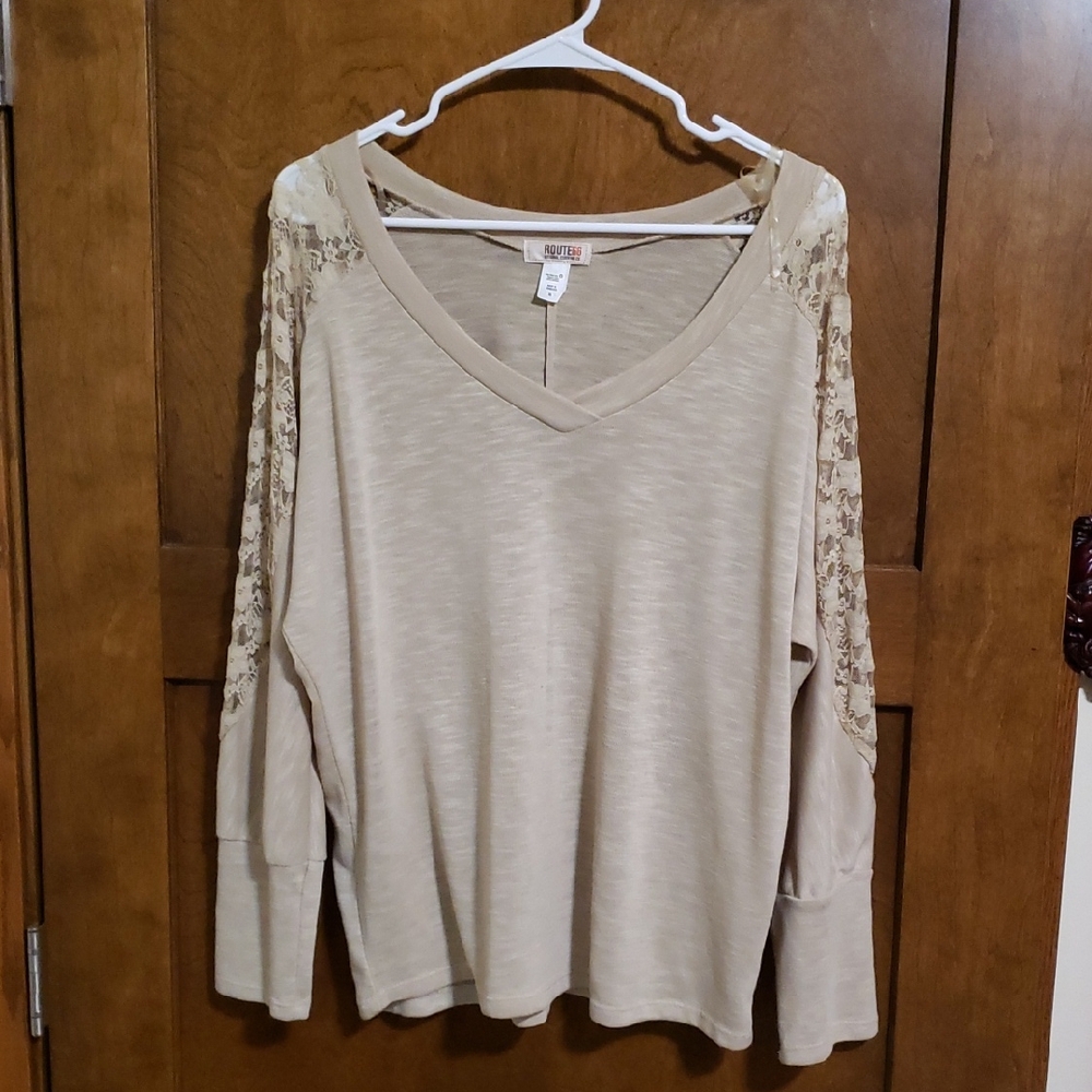 Light knit vee neck pullover with  lace inserts along sleeves.Bin#7